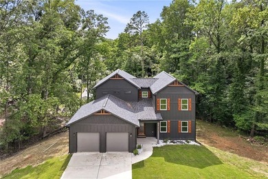 Welcome to lakeside living on Lake Lanier in the sought-after - photo 3