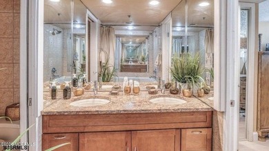 PENTHOUSE W/OCEAN VIEWS... this 2 bed/2 bath luxury penthouse