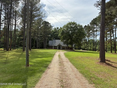 Nestled among towering pines with peaceful pond views, this - photo 31