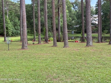 Nestled among towering pines with peaceful pond views, this - photo 37