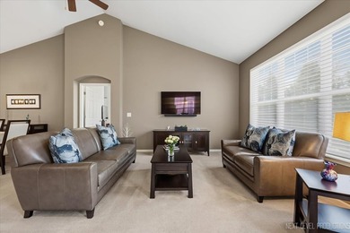 Enjoy carefree, low-maintenance living in this meticulously - photo 2