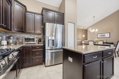 Enjoy carefree, low-maintenance living in this meticulously - photo 9