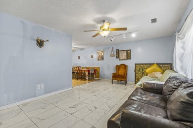 Tucked away in the highly desirable Rosewood community, this - photo 2