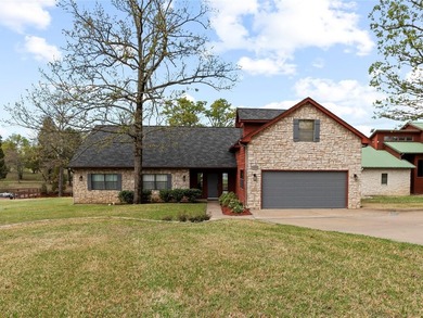 Tucked inside a sought-after gated community, this waterfront - photo 2