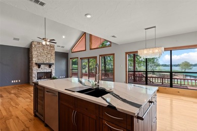 Tucked inside a sought-after gated community, this waterfront - photo 6