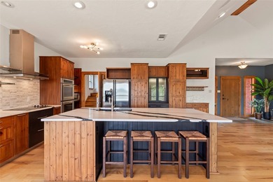 Tucked inside a sought-after gated community, this waterfront - photo 7