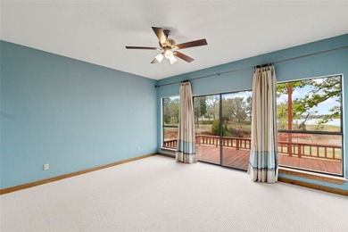 Tucked inside a sought-after gated community, this waterfront - photo 9
