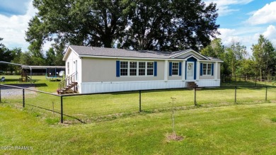 Lake Home For Sale in Arnaudville, Louisiana