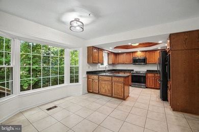 Spacious 4BR, 2.5BA Colonial with Dramatic Two-Story Family Room - photo 11
