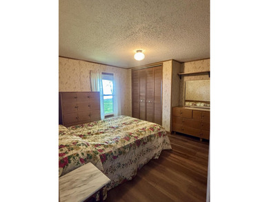 Meticulously maintained manufactured home on the shores of - photo 11