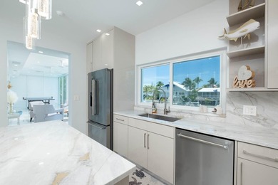 Coastal elegance meets the ultimate boating lifestyle in this - photo 20