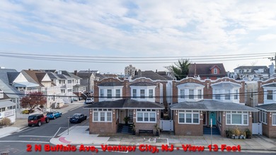 Located just a short walk from the shoreline, this newly