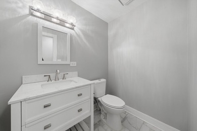Step into a fully renovated garden condo in the heart of - photo 11