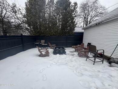 This contemporary 4-bedroom, 2-bath home blends clean modern