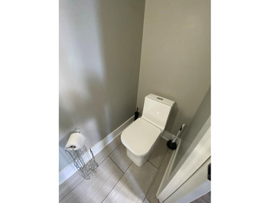 French Country Two-Story Brick Home! Located in the Rehobeth