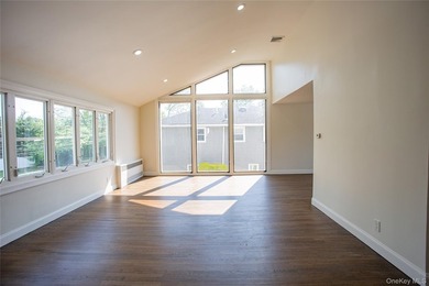 Welcome to this masterfully renovated High Ranch, offering the - photo 18