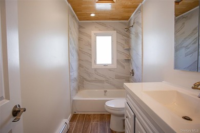 Welcome to this masterfully renovated High Ranch, offering the - photo 20
