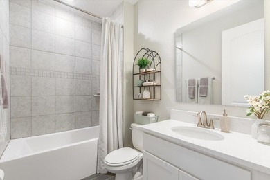 Former Model Home - Situated in Elegant Manor Estates, you will - photo 25