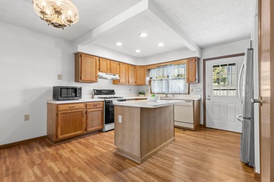 Move in ready end unit condo that has been lovingly cared for