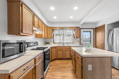 Move in ready end unit condo that has been lovingly cared for