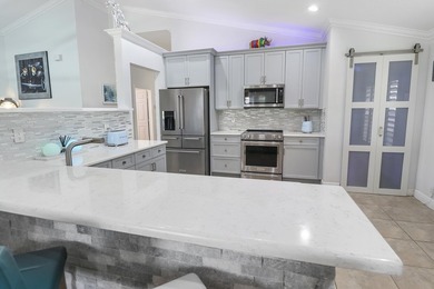 This home offers Luxury living with Expansive Golf Views! NO