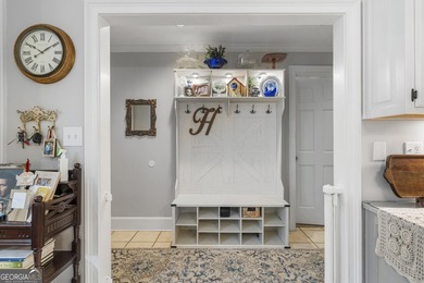 Welcome to this stunning four-sided brick lakefront retreat - photo 15