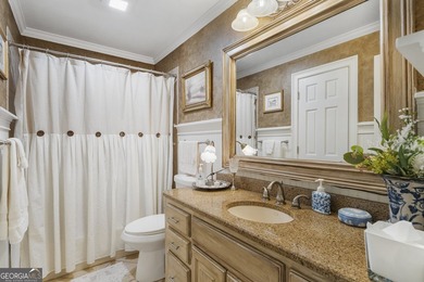 Welcome to this stunning four-sided brick lakefront retreat - photo 16