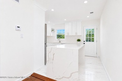 Welcome to 216 Woodrow Road, a beautifully renovated - photo 8
