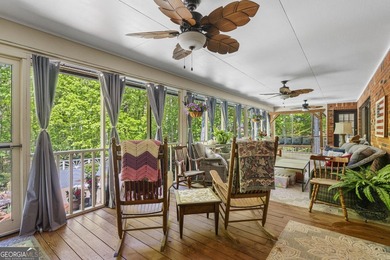 Welcome to this stunning four-sided brick lakefront retreat - photo 19