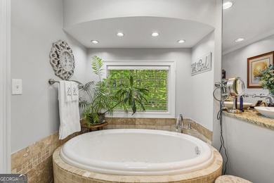Welcome to this stunning four-sided brick lakefront retreat - photo 22