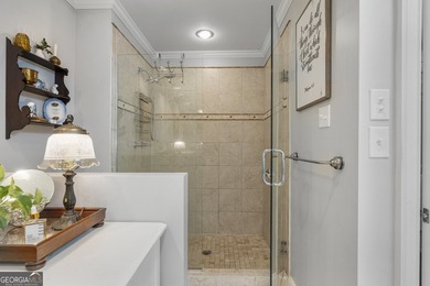 Welcome to this stunning four-sided brick lakefront retreat - photo 24