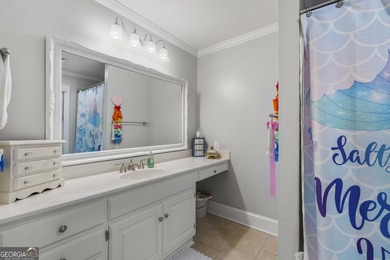Welcome to this stunning four-sided brick lakefront retreat - photo 26