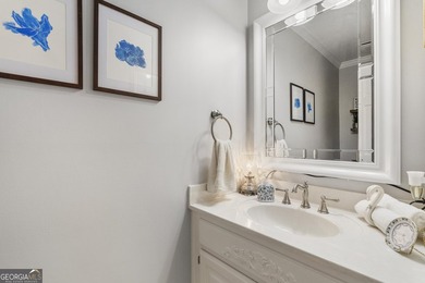 Welcome to this stunning four-sided brick lakefront retreat - photo 29