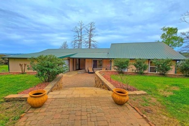 Located on the Old Spanish Trail, this WATERFRONT home sits on - Lake Home For Sale in Milam, Texas
