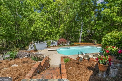 Welcome to this stunning four-sided brick lakefront retreat - photo 34