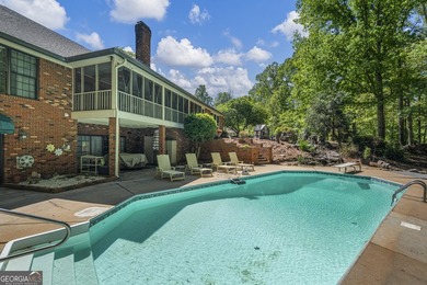 Welcome to this stunning four-sided brick lakefront retreat - photo 35