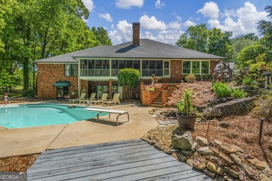 Welcome to this stunning four-sided brick lakefront retreat - photo 37