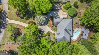 Welcome to this stunning four-sided brick lakefront retreat - photo 38