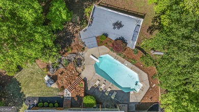 Welcome to this stunning four-sided brick lakefront retreat - photo 39