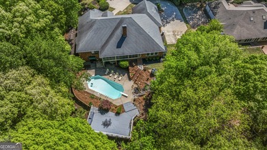 Welcome to this stunning four-sided brick lakefront retreat - photo 40