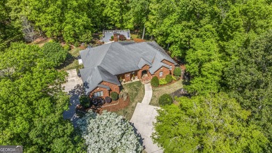 Welcome to this stunning four-sided brick lakefront retreat - photo 41
