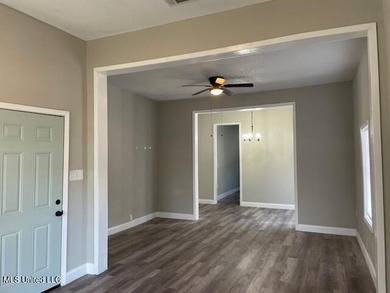 REPAIRED and READY for new owners!! Home qualifies for USDA! We - photo 2