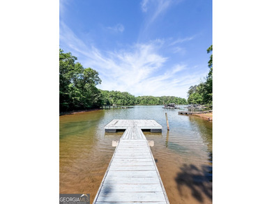 Welcome to this stunning four-sided brick lakefront retreat - photo 44