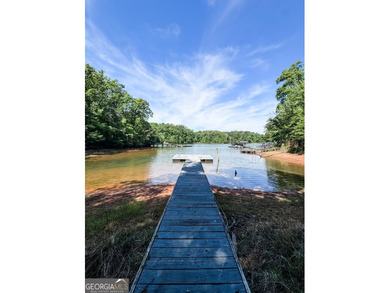 Welcome to this stunning four-sided brick lakefront retreat - photo 45