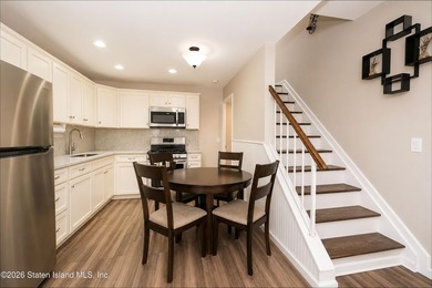 LOOK NO FURTHER!! THIS BEAUTIFULLY RENOVATED END-UNIT CONDO IS - photo 6