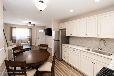 LOOK NO FURTHER!! THIS BEAUTIFULLY RENOVATED END-UNIT CONDO IS - photo 7