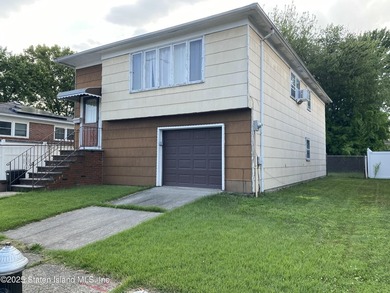 This spacious Raised Ranch is located in the heart of - photo 2