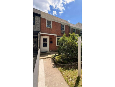 Charming 3-bedroom, 1.5-bath residence featuring a spacious - photo 1