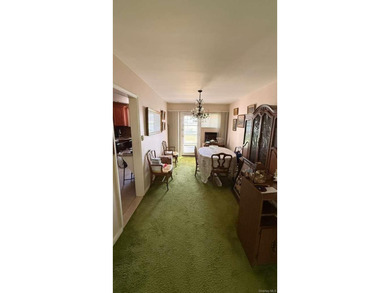 Charming 3-bedroom, 1.5-bath residence featuring a spacious - photo 3