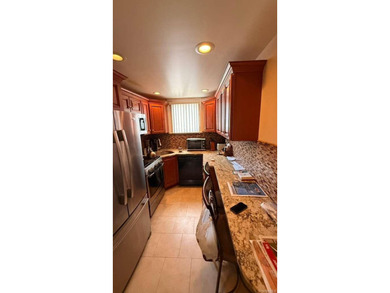 Charming 3-bedroom, 1.5-bath residence featuring a spacious - photo 4